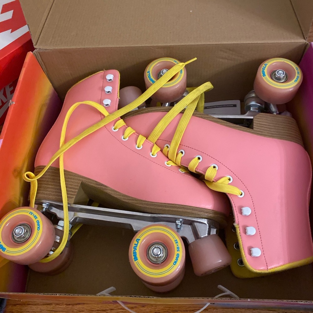 Women’s size 8 pink and yellow Impala Roller Skates barely worn!